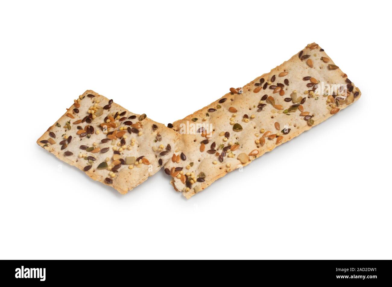 Studio shot of multi seed flatbread cut out against a white background - John Gollop Stock Photo
