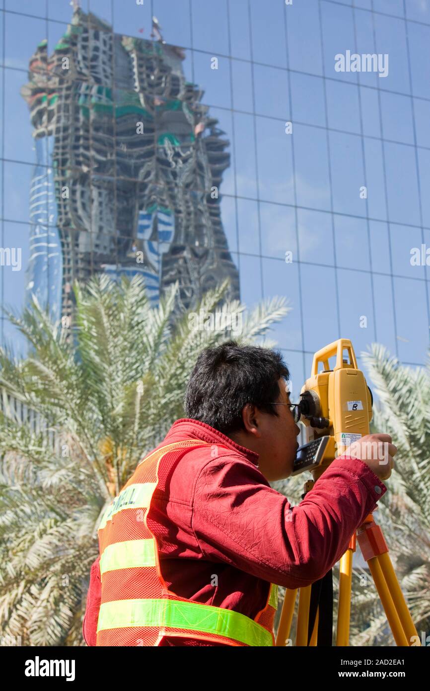A surveyor working on a construction project in Dubai. Stock Photo