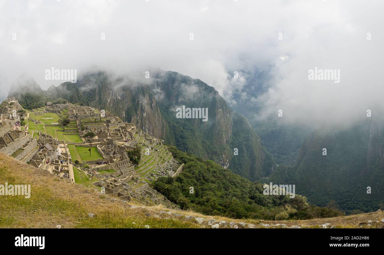 Machu Picchu is an Incan citadel set high in the Andes Mountains in Peru, above the Urubamba River valley. Built in the 15th century and later abandon Stock Photo