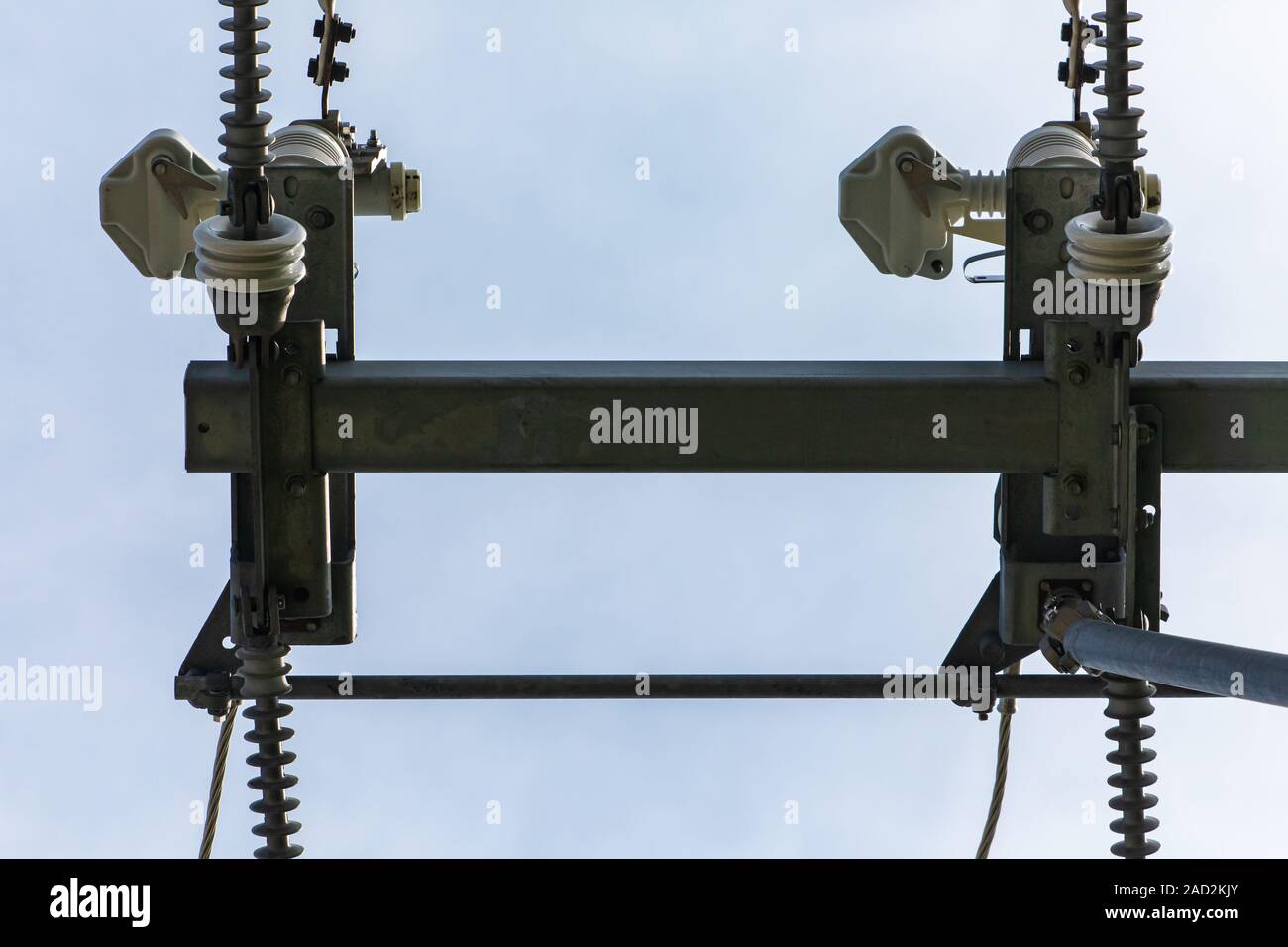 high voltage electrical substation tower top, close up down view on