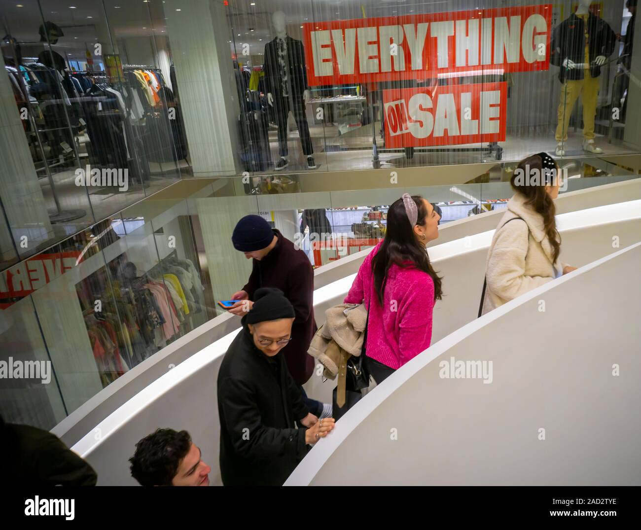 The Barneys store on Seventh Avenue in New York is festooned with signs informing loyal fans that the store is liquidating, seen on Saturday, November 23, 2019. The iconic fashion outposts were sold to B. Riley Financial, liquidation specialists, while the intellectual property went to Authentic Brands Group. (© Richard B. Levine) Stock Photo