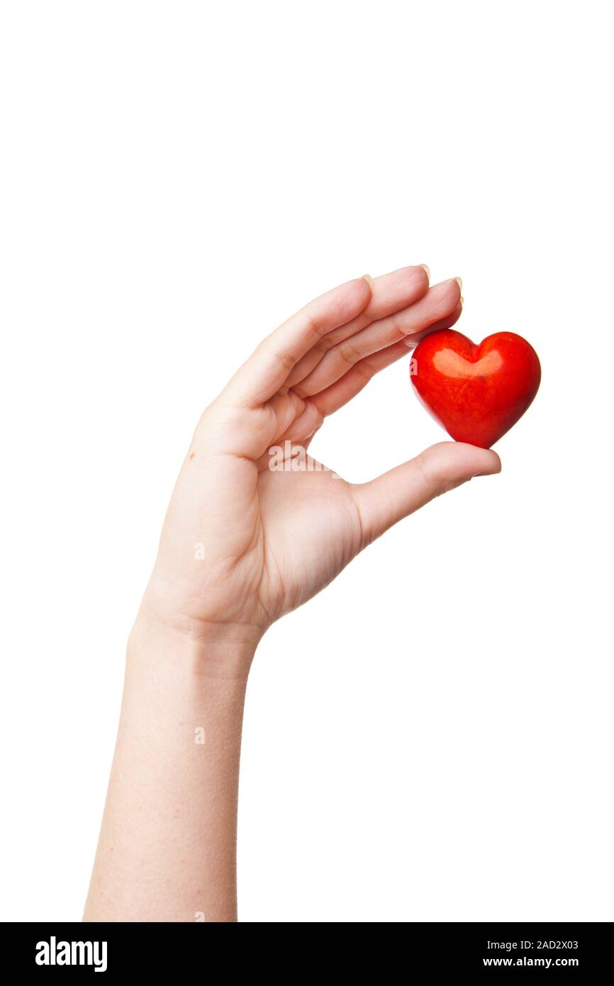 Woman's hand with heart symbol isolated Stock Photo Alamy