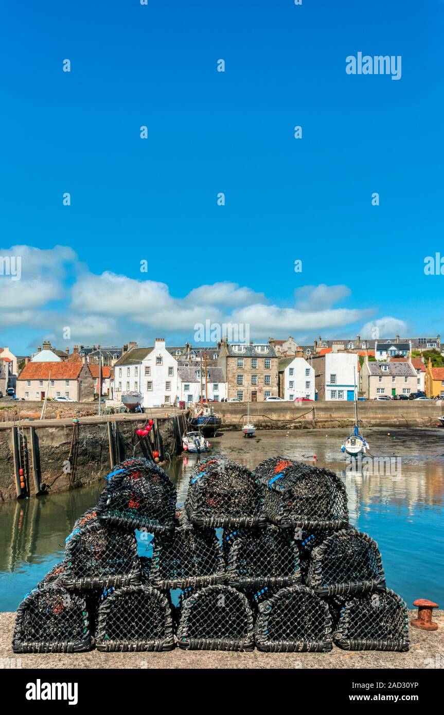 Seafront of the picturesque seaside village of St Monans in the East Neuk of Fife, Scotland, seen across the habour. Stock Photo