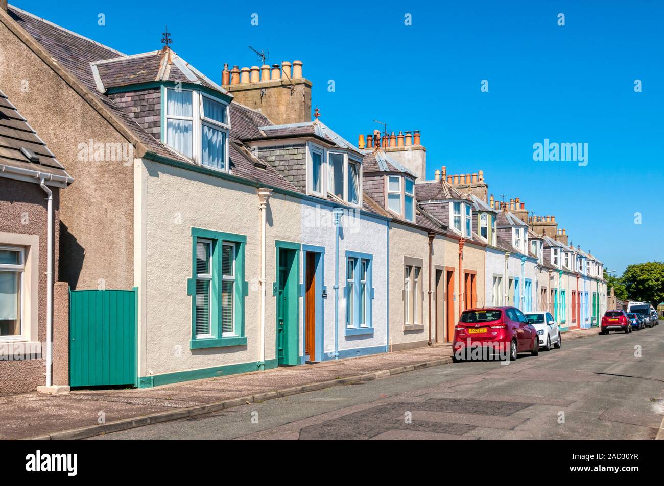 A terrace of traditional fishermen's homes in St Monan's, Fife.  Single-storey with dormer windows. Stock Photo