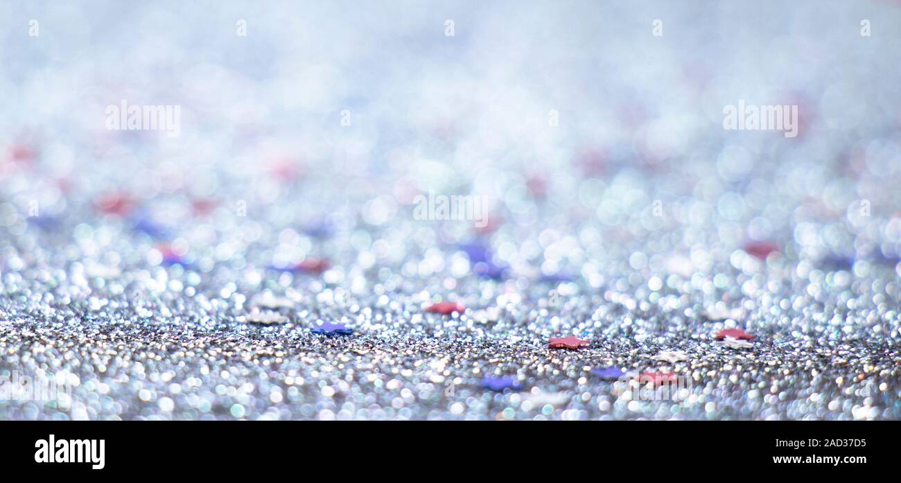 Abstract blurry cold icy winter luxurious holiday glitter background with shiny glowing stars Stock Photo