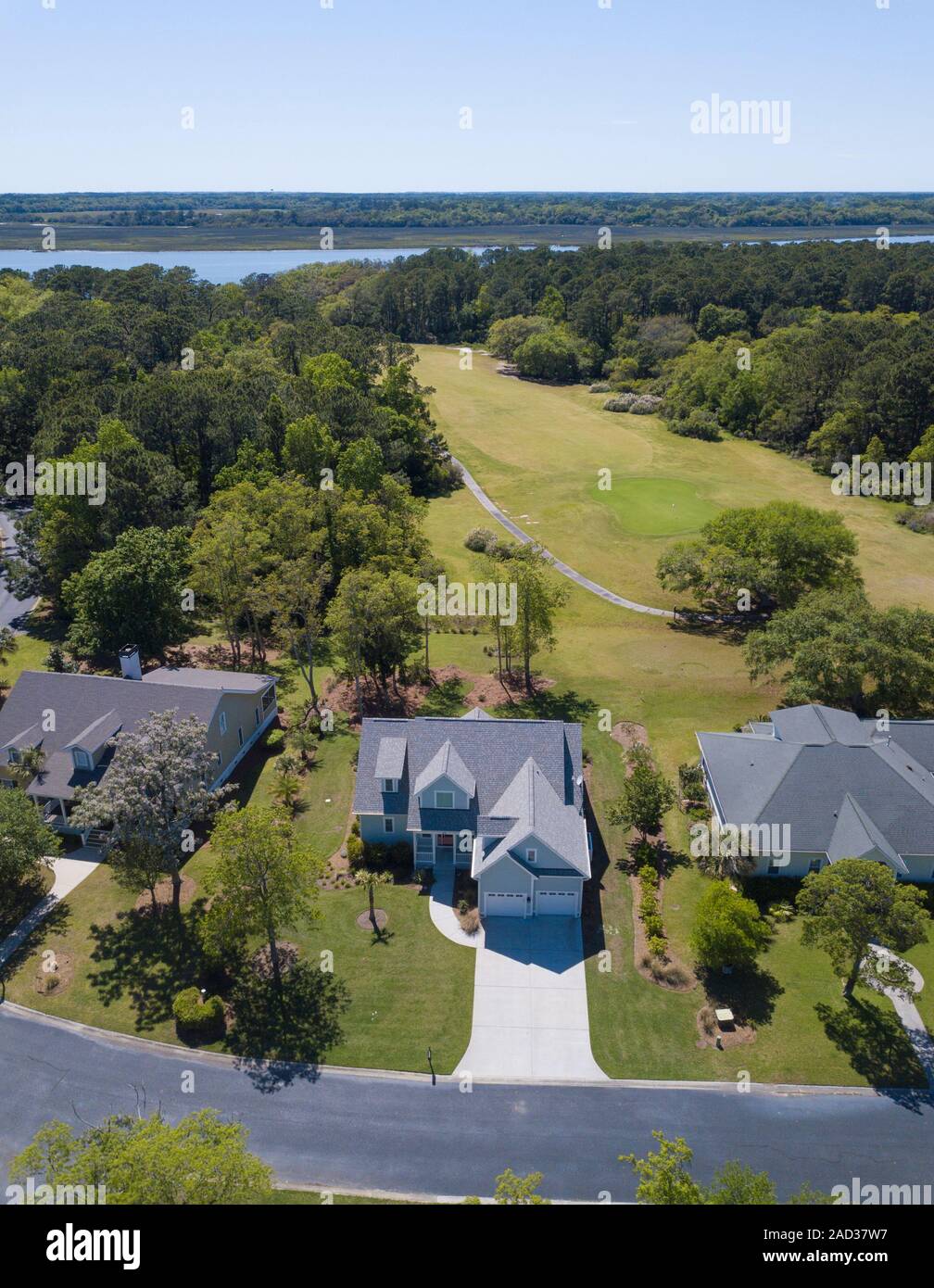 Aerial view of beautiful home on golf course and river Stock Photo Alamy