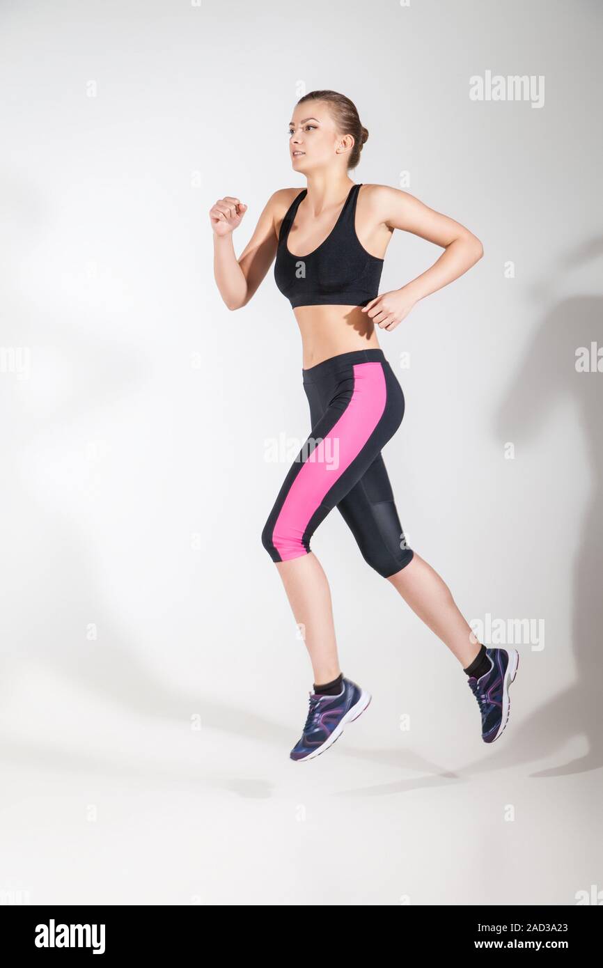 Beautiful woman running hi-res stock photography and images - Alamy