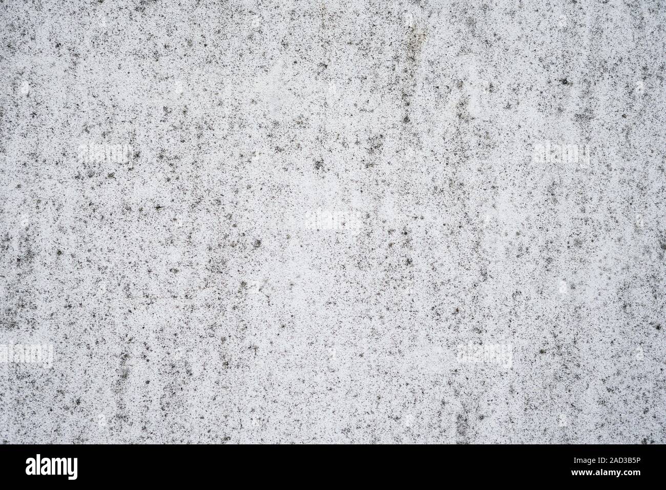 weathered wall grunge background, white plaster with black distressed texture Stock Photo