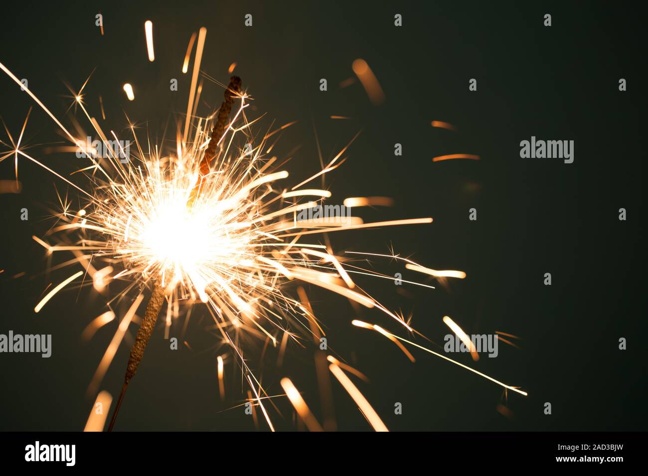 Christmas sparkler on black background Stock Photo