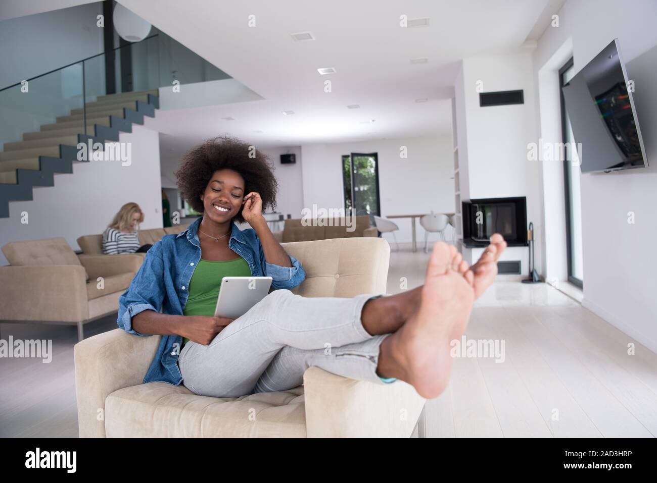 african american woman at home with digital tablet Stock Photo - Alamy