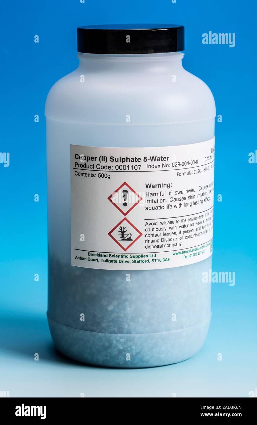 Copper II sulphate pentahydrate. Bottle containing crystals of copper II sulphate pentahydrate