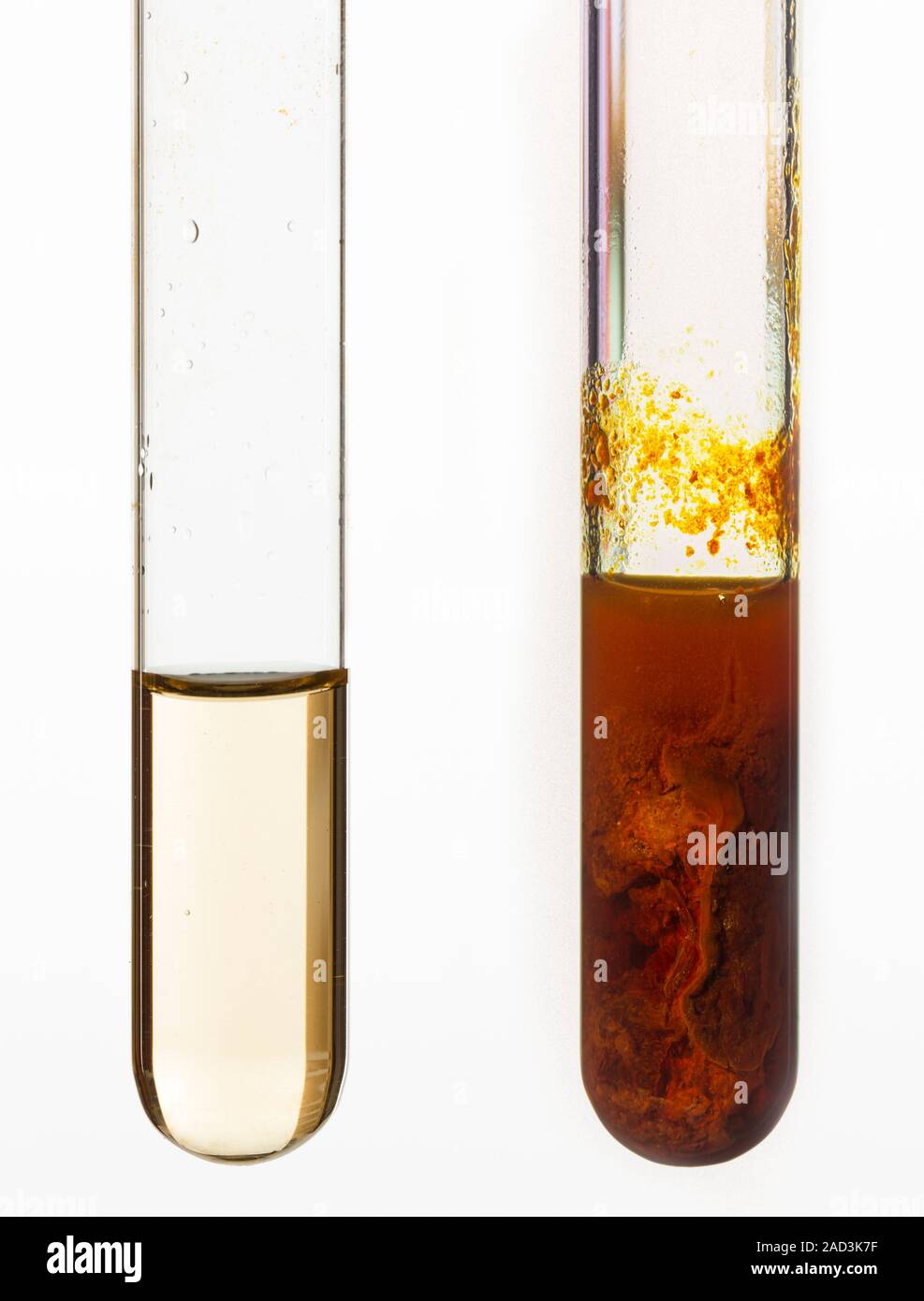 Sodium hydroxide and iron III chloride. Test tube containing sodium