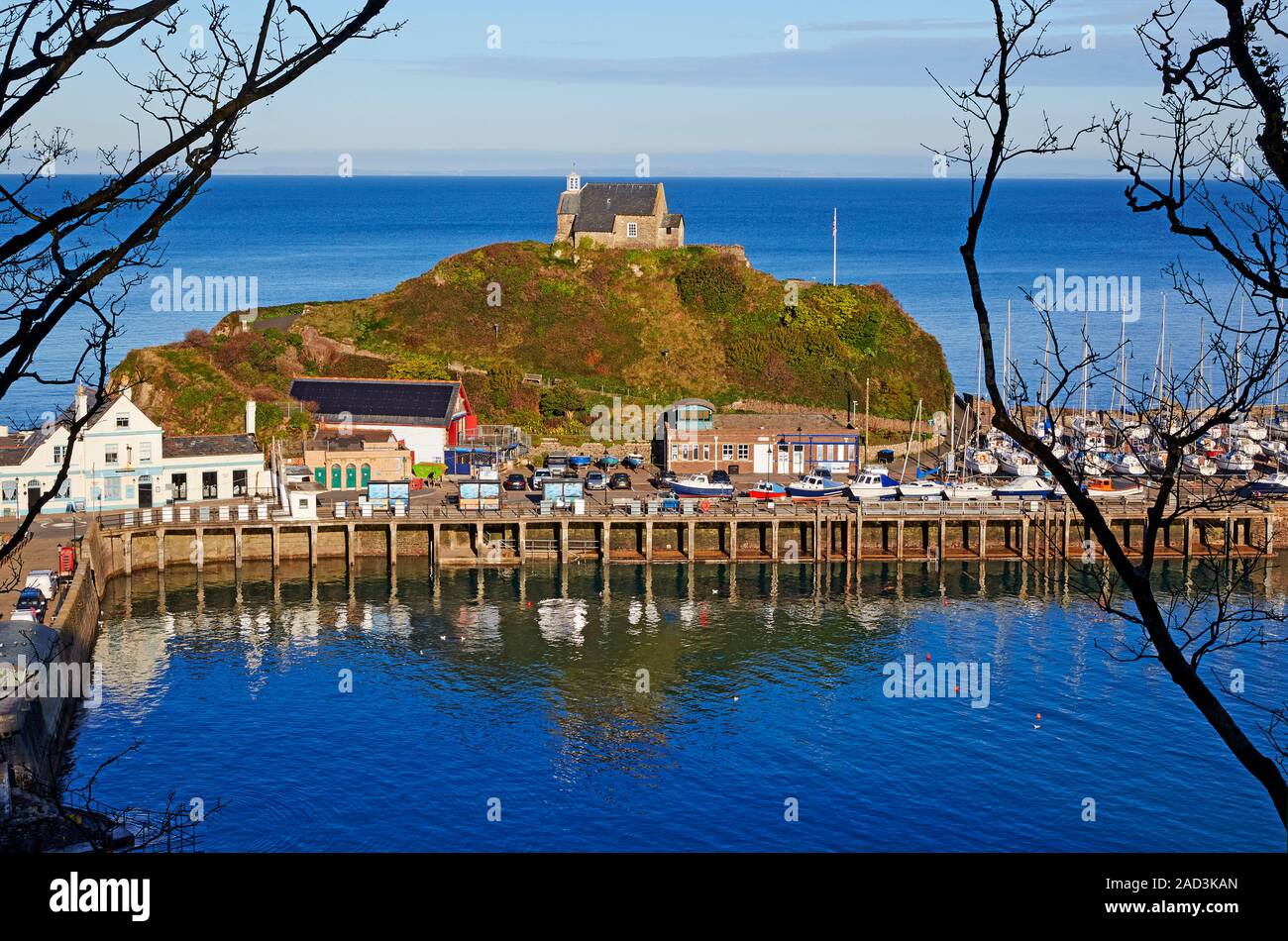 Trail over the Devon seaside town of with path meandering in foreground Stock Photo