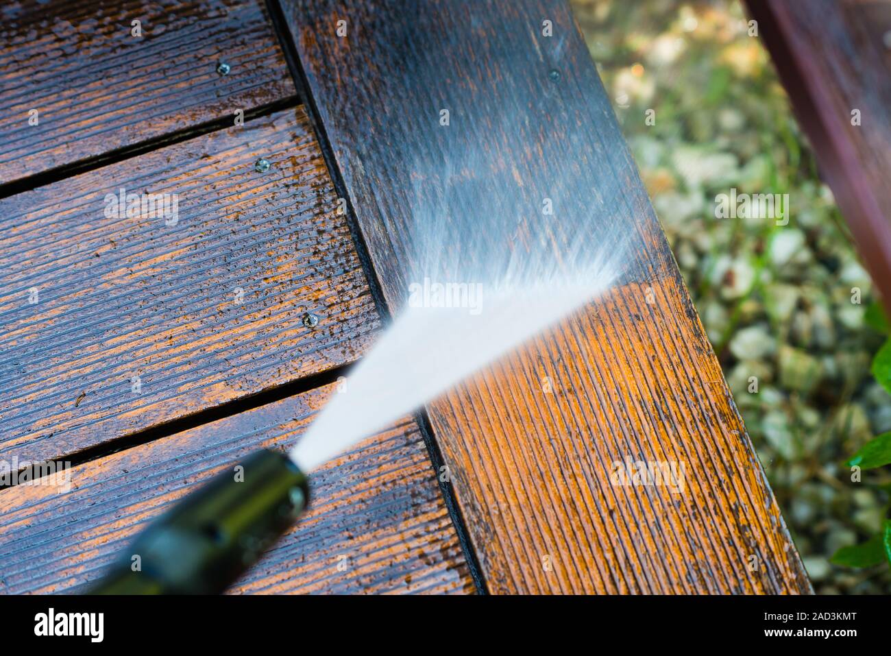 cleaning terrace with a pressure washer Stock Photo Alamy