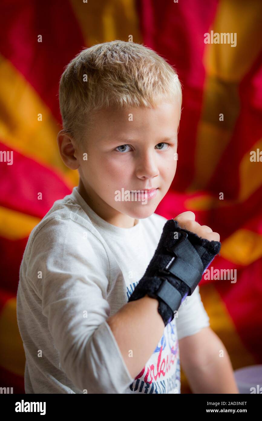 Boy with brace on broken wrist. 7yearold boy with broken bones in his