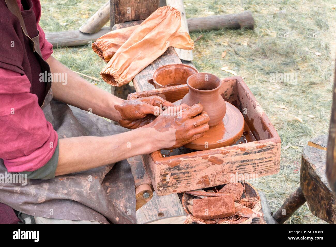 Process Of Creating Relief On Clay Pot With Textured Comb Spin On