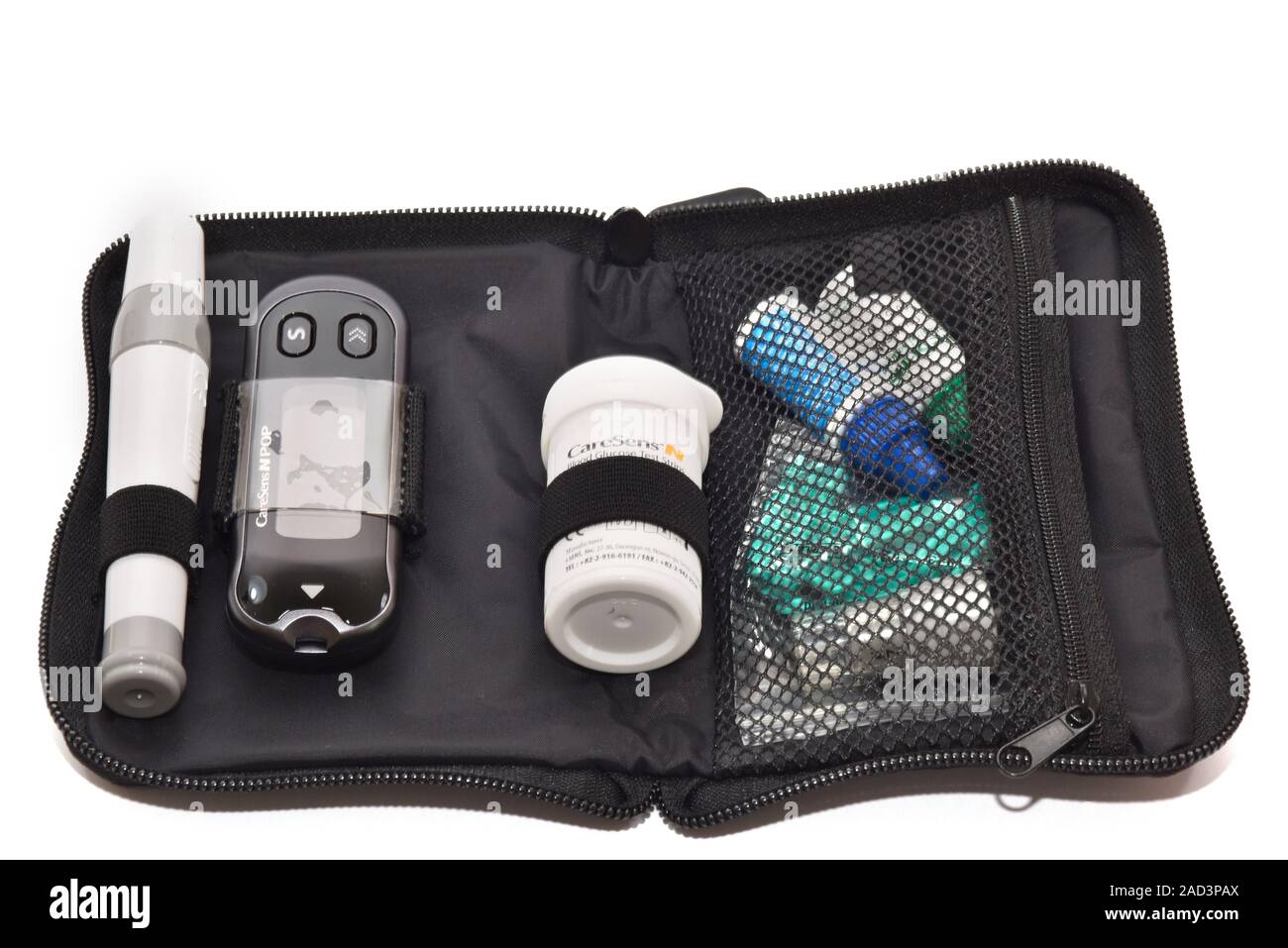 Blood glucose monitor. Pouch containing a digital monitor