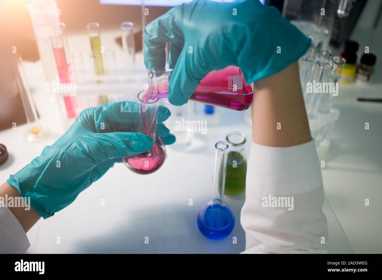 Lab assistant carries chemical testing Stock Photo Alamy