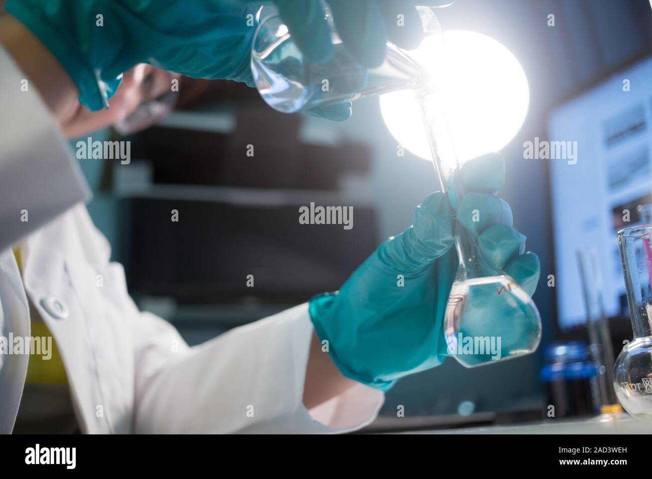 Lab technician in rubber gloves Stock Photo