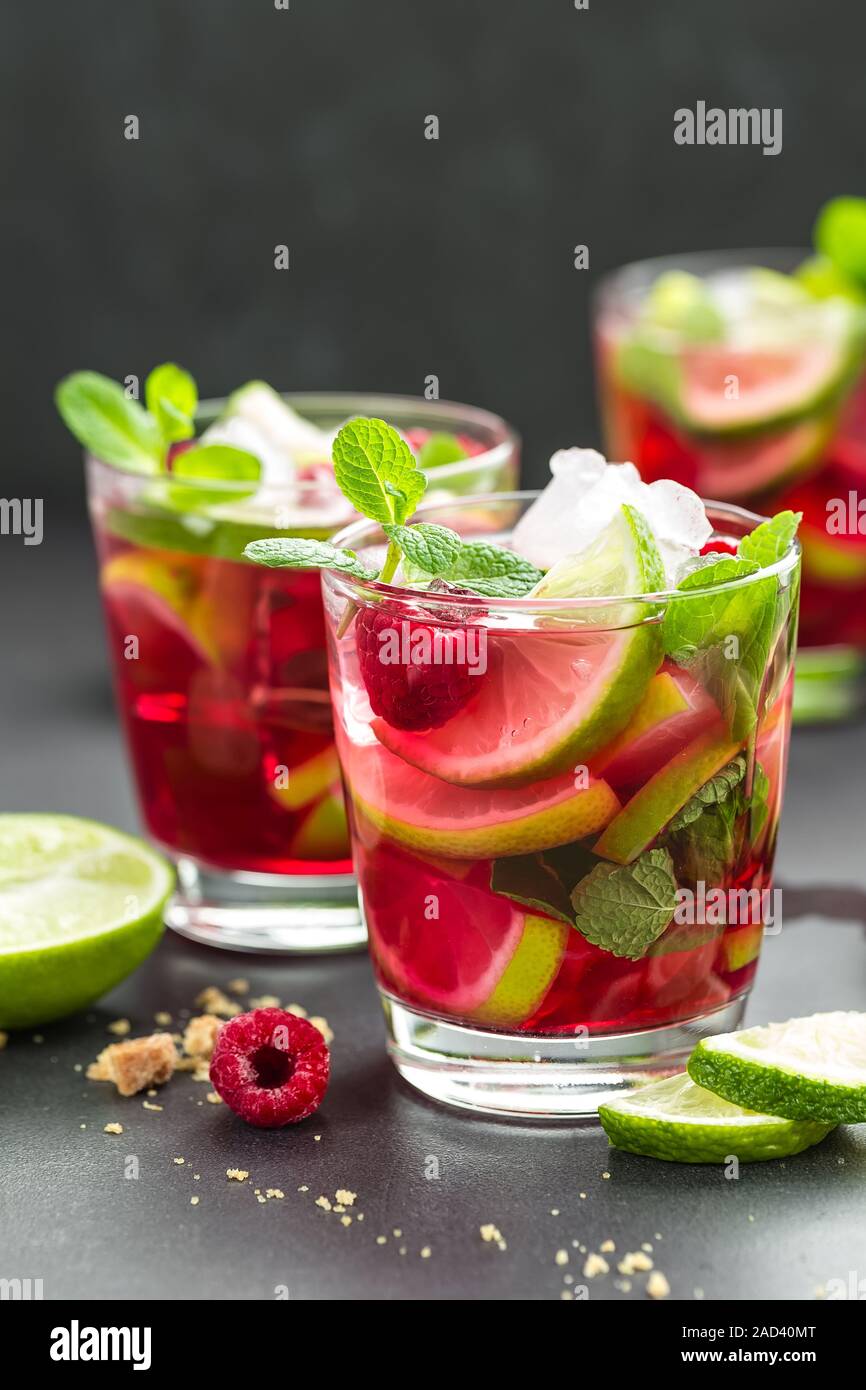 Raspberry Mojito Cocktail With Lime Mint And Ice Cold Refreshing Drink Stock Photo Alamy