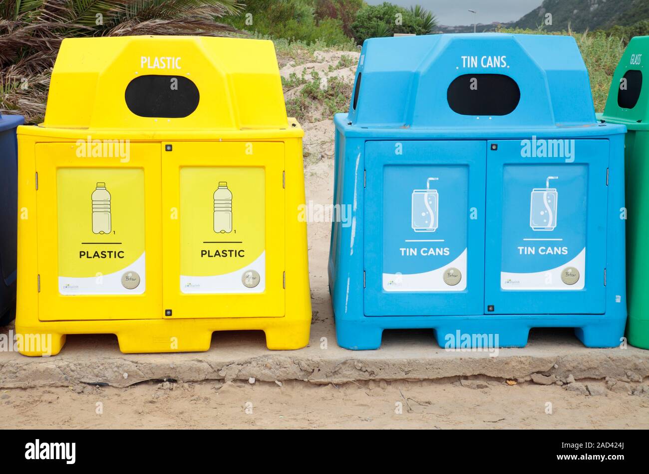 Recycling bins. Plastic and tin can recycling bins. Photographed in