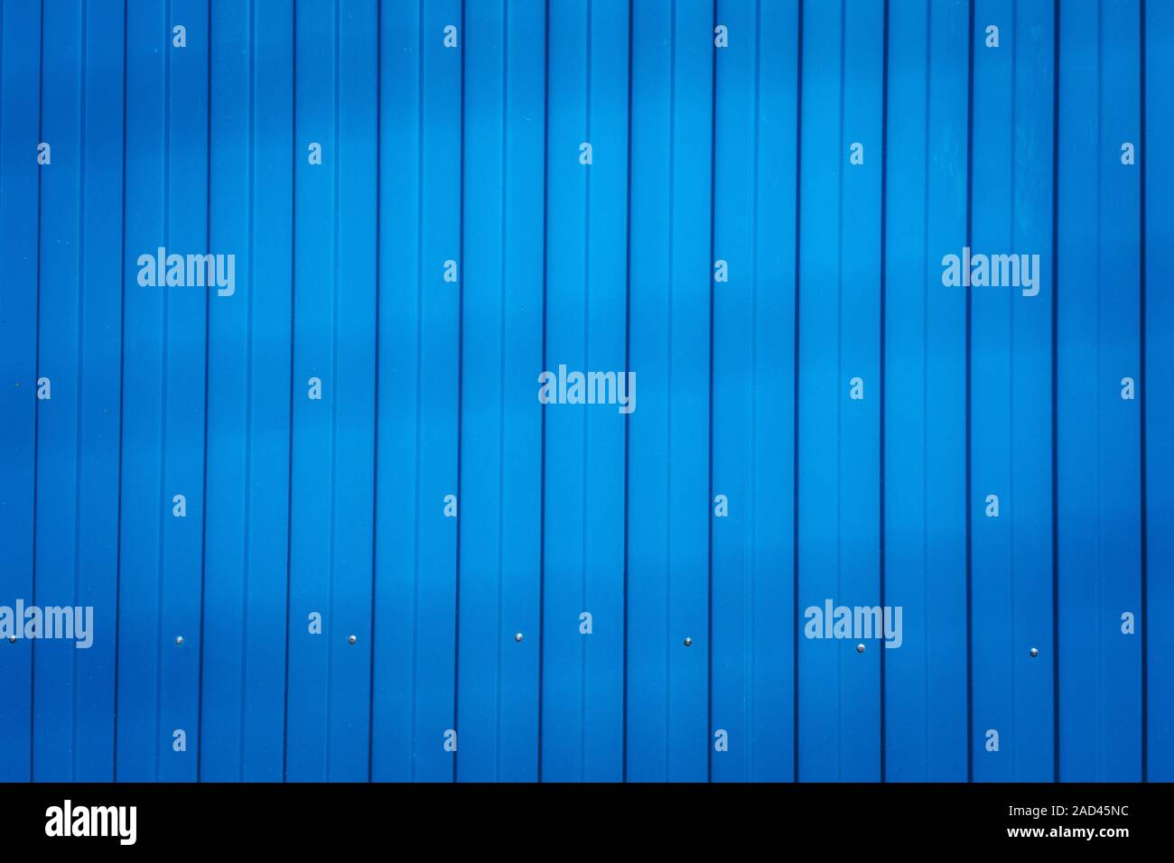 Bright Blue Color Corrugated Zinc Fence Closeup Glossy Metal