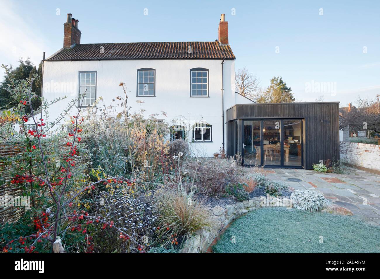 Listed period house with modern extension and garden on a frosty winter morning. Bristol. UK. Stock Photo