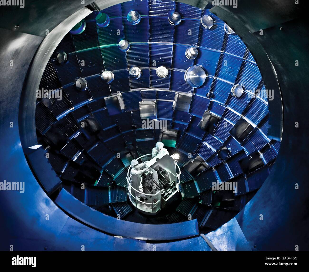 National Ignition Facility fusion device. Technicians using a service