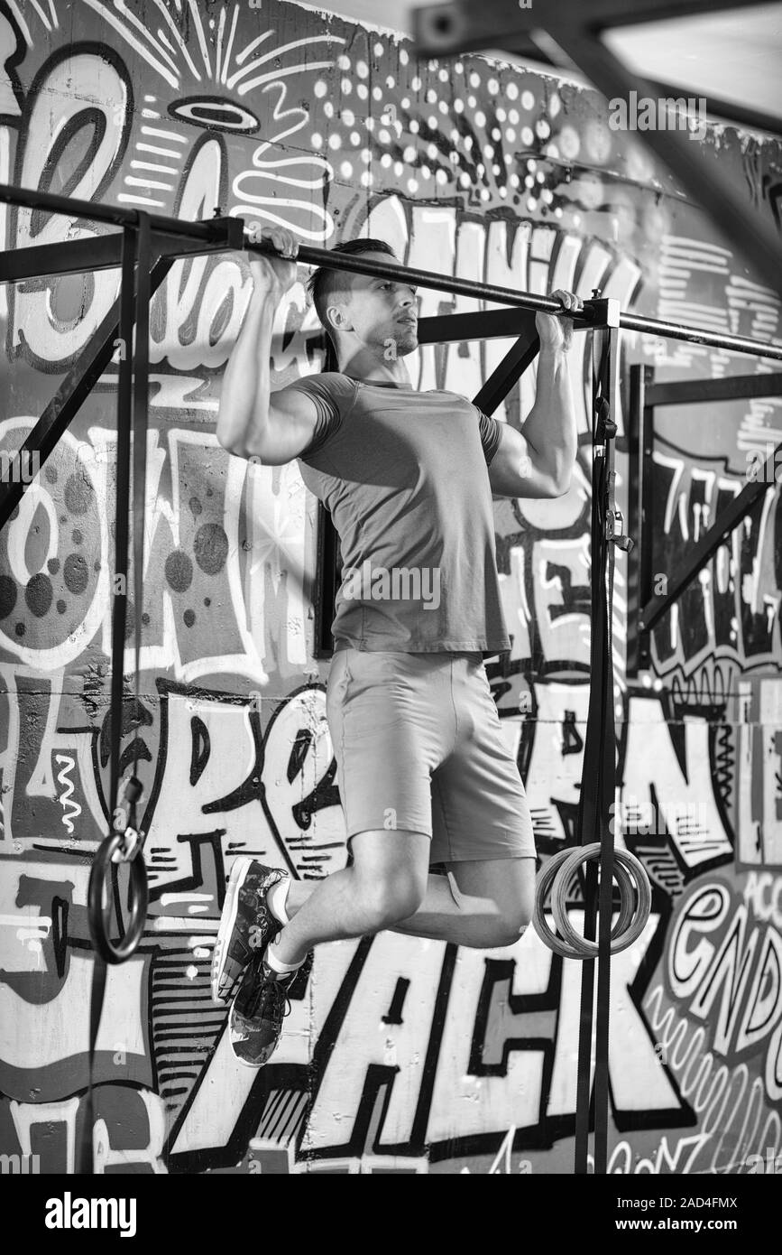 man doing pull ups Stock Photo - Alamy