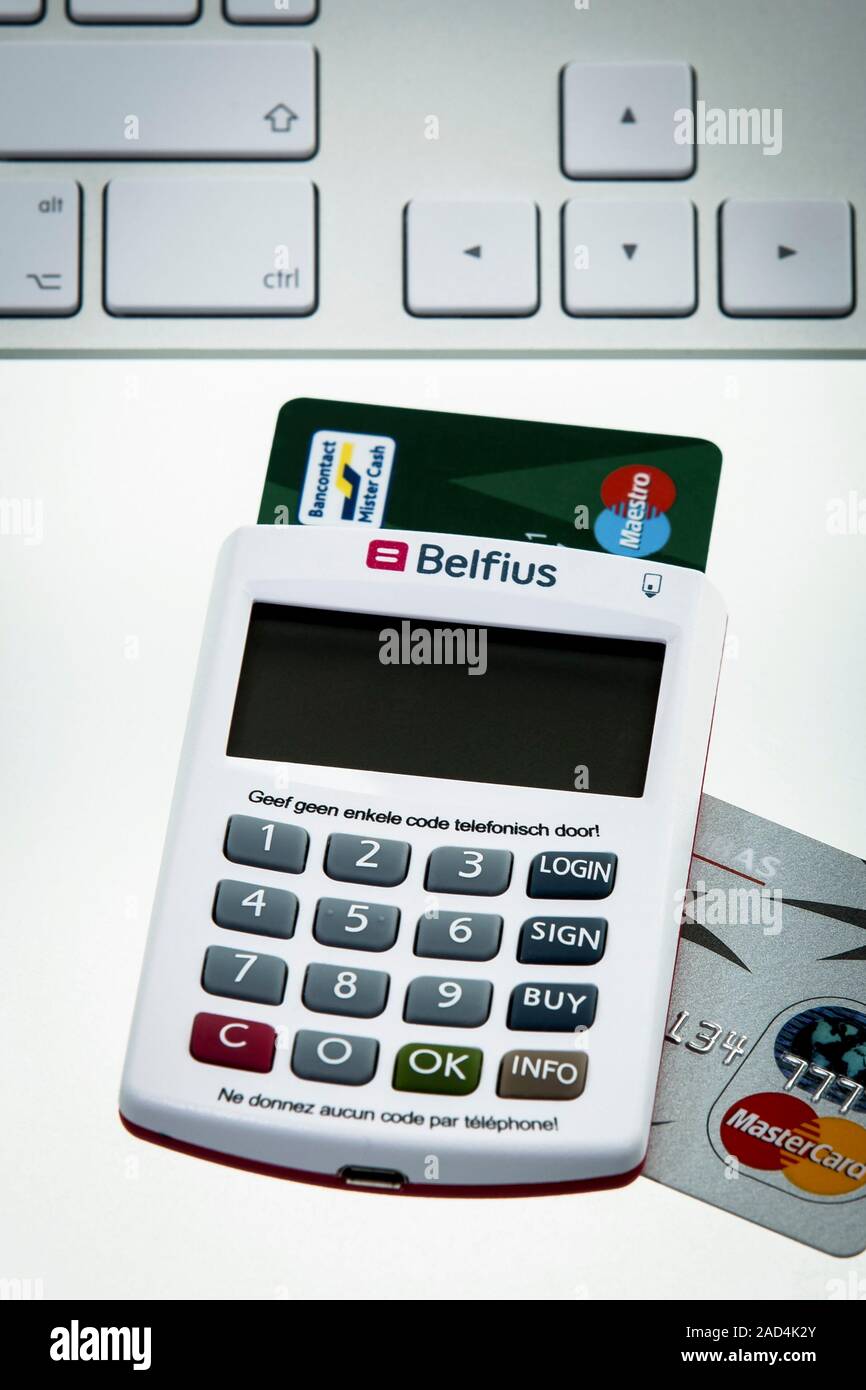 Online banking. Security device used in online banking and other financial transactions. This device is designed to have a bank card inserted to allow Stock Photo
