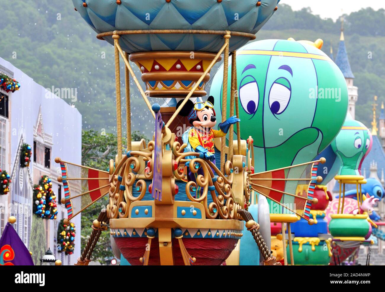HONG KONG - DEC 2015: Parade in Disneyland with famous cartoon characters in Hong Kong on November 2015 in China Stock Photo