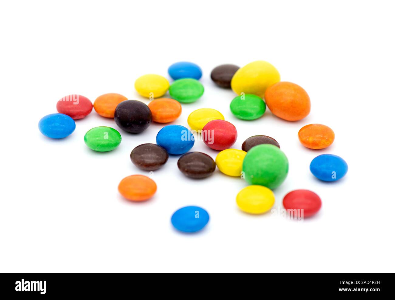 Colorful Candies isolated on white Background, chocolate coated Candies Stock Photo
