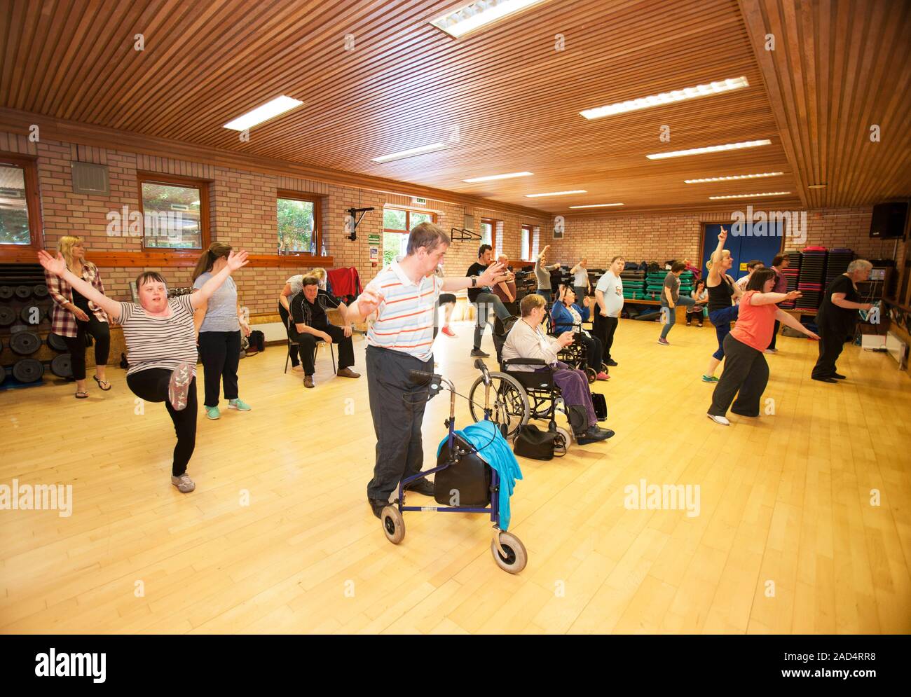 Exercise class for disabled people. Group of people with physical and