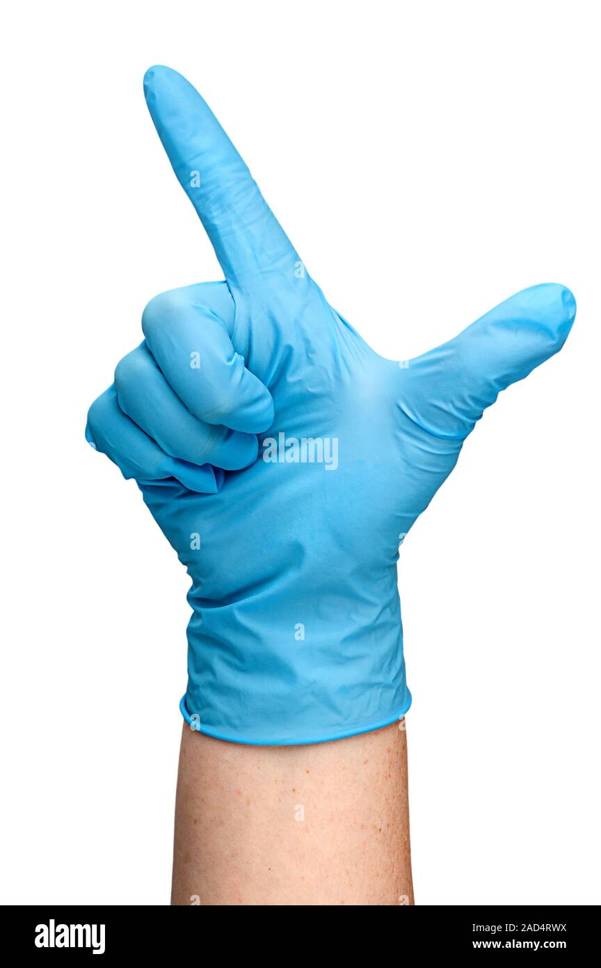 Hand in blue latex glove showing two fingers vertically Stock Photo Alamy