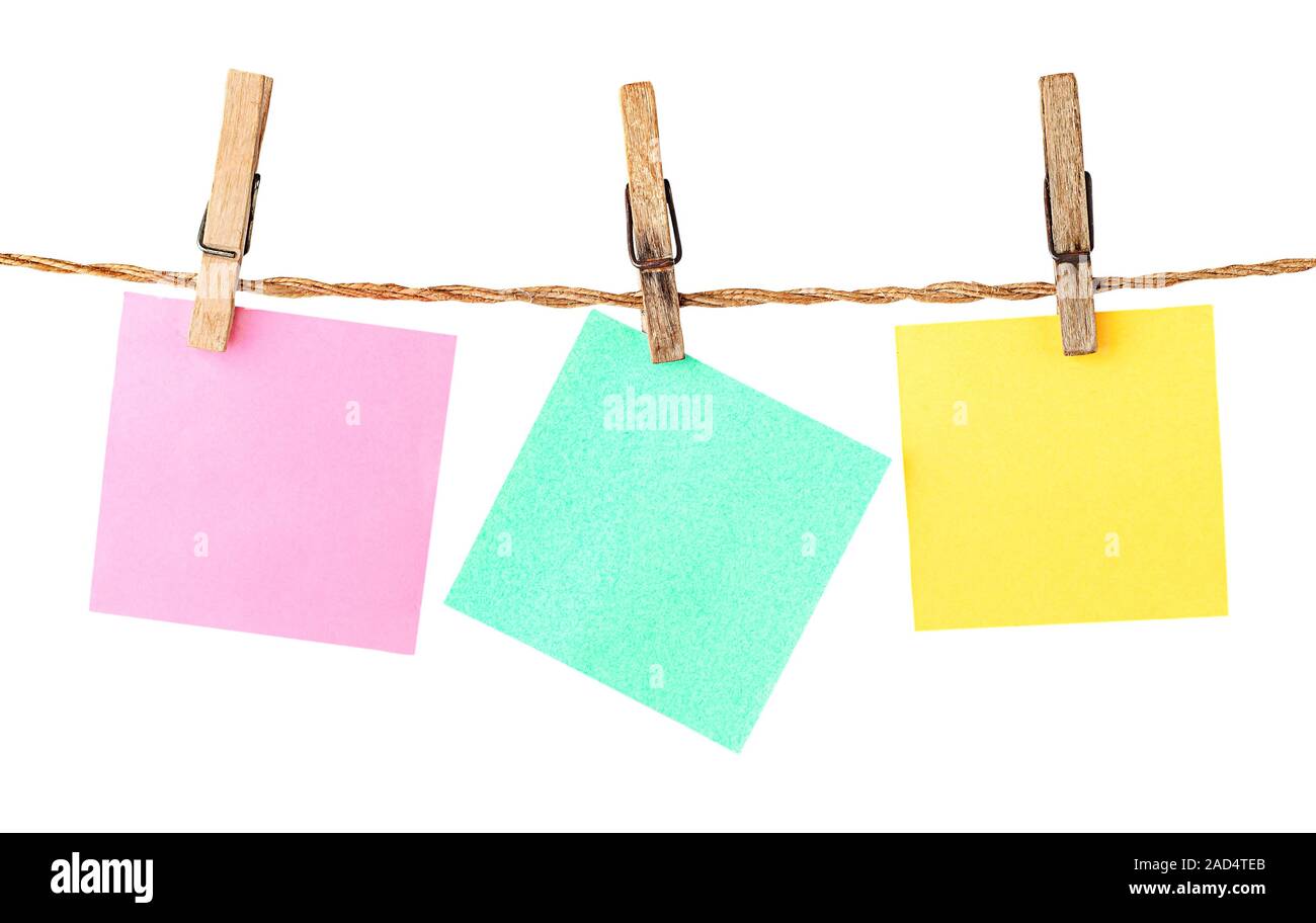 Multicolored paper stickers on clothespins Stock Photo