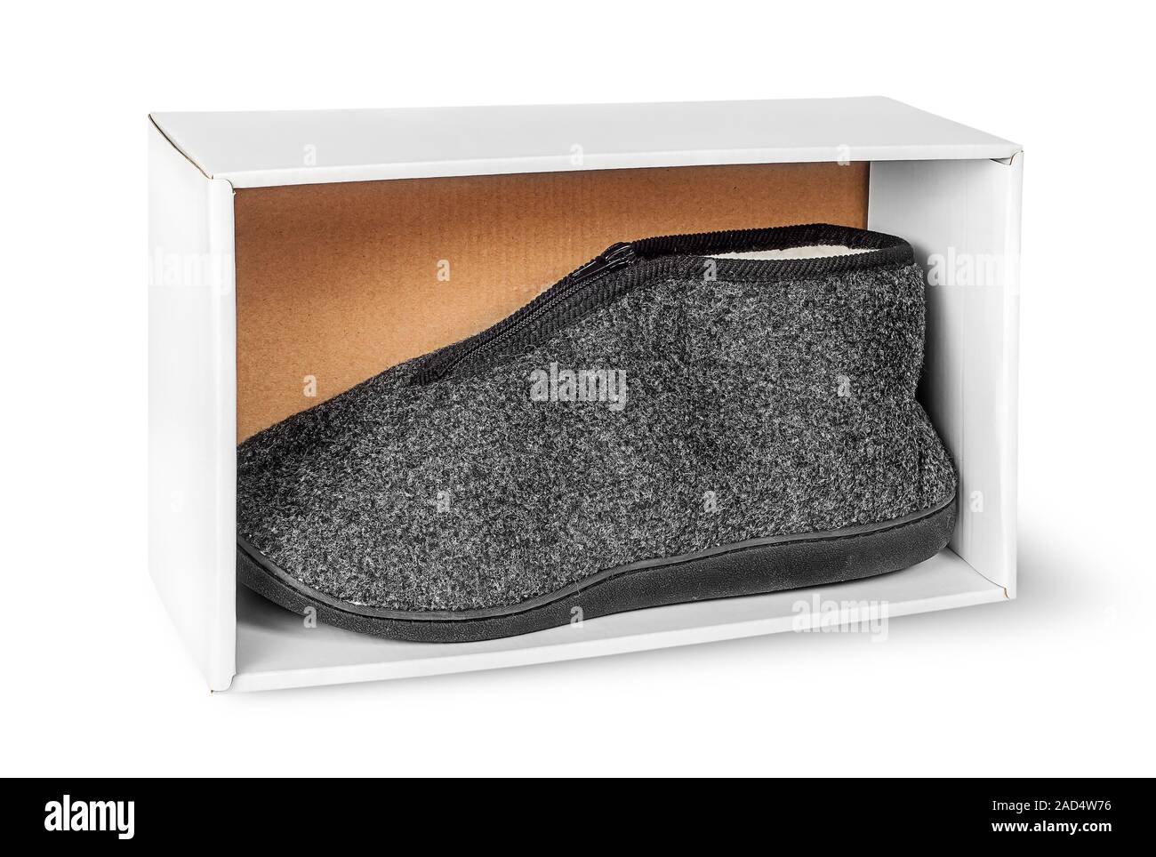 Single slipper in white cardboard box Stock Photo