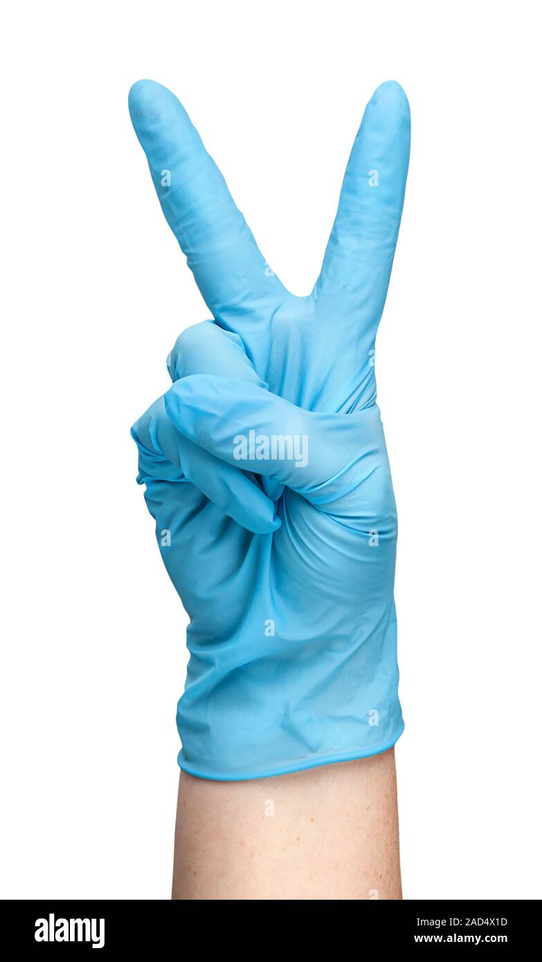 Hand in blue latex glove showing two fingers Stock Photo Alamy