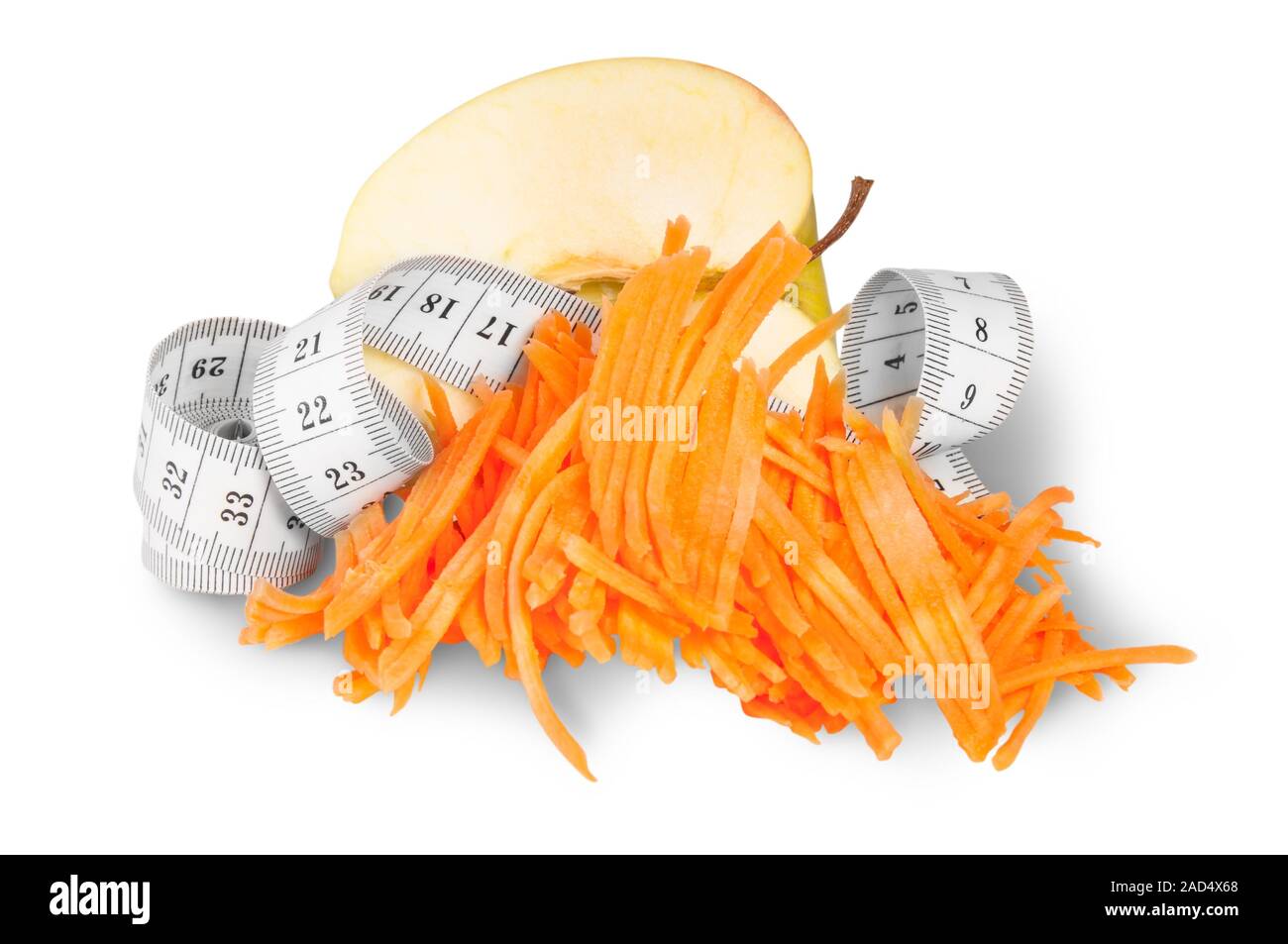 Half An Apple With Grated Carrots And Sewing Measuring Stock Photo