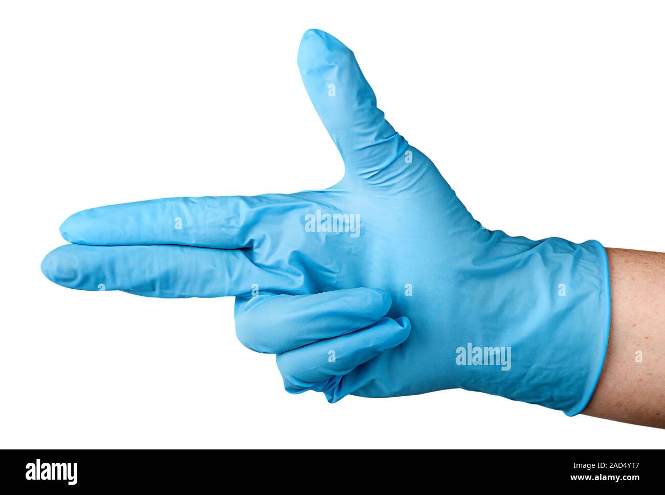 Hand in blue latex glove fingers pistol Stock Photo