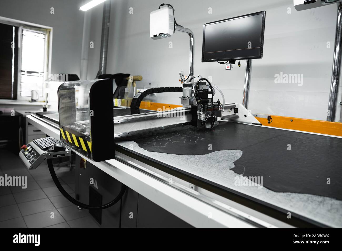 CNC machine for cutting fabrics textile materials and leather. Modern