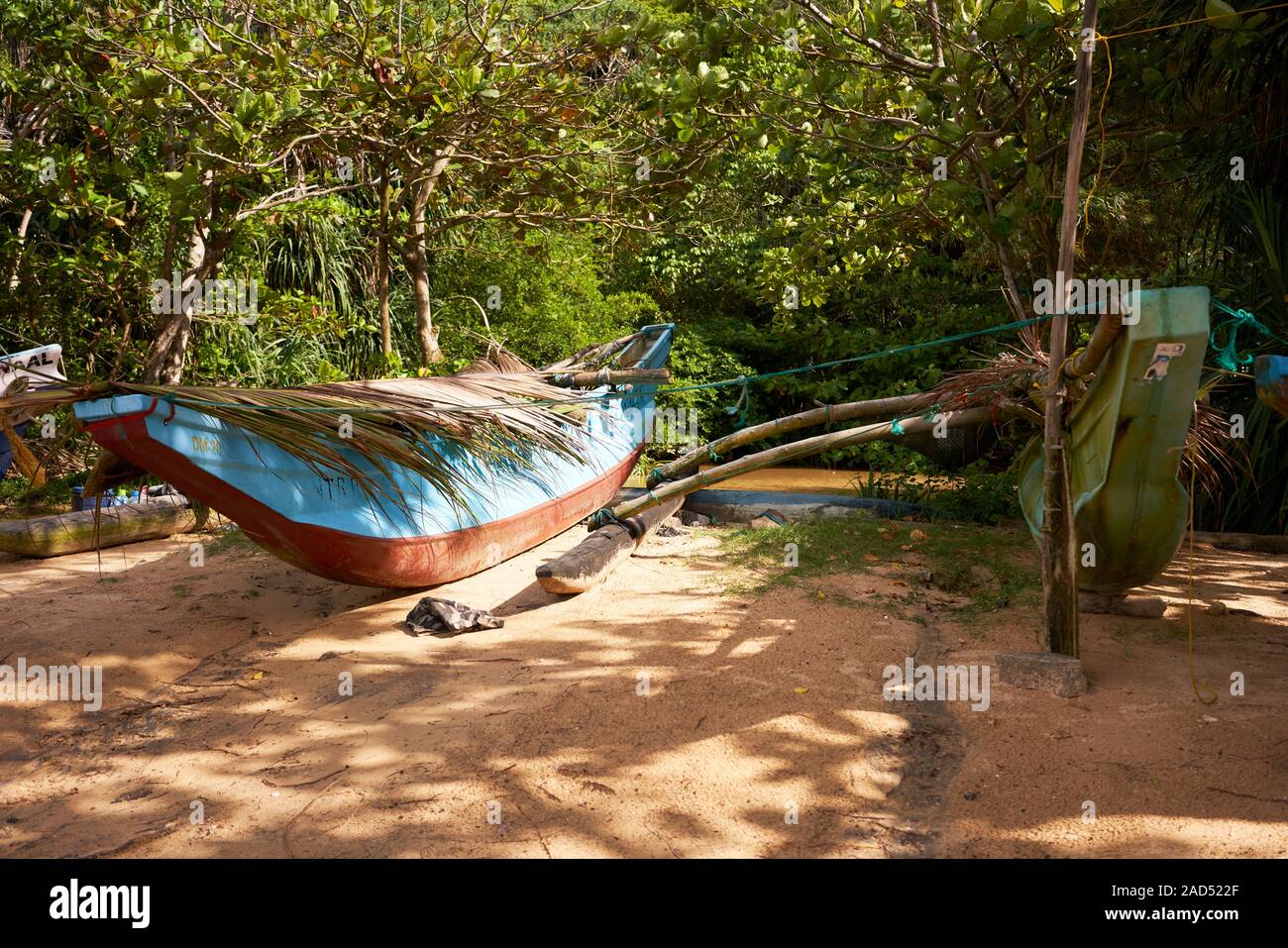 Covered catamaran on Jungle beach near Unawatuna, Sri Lanka Stock Photo