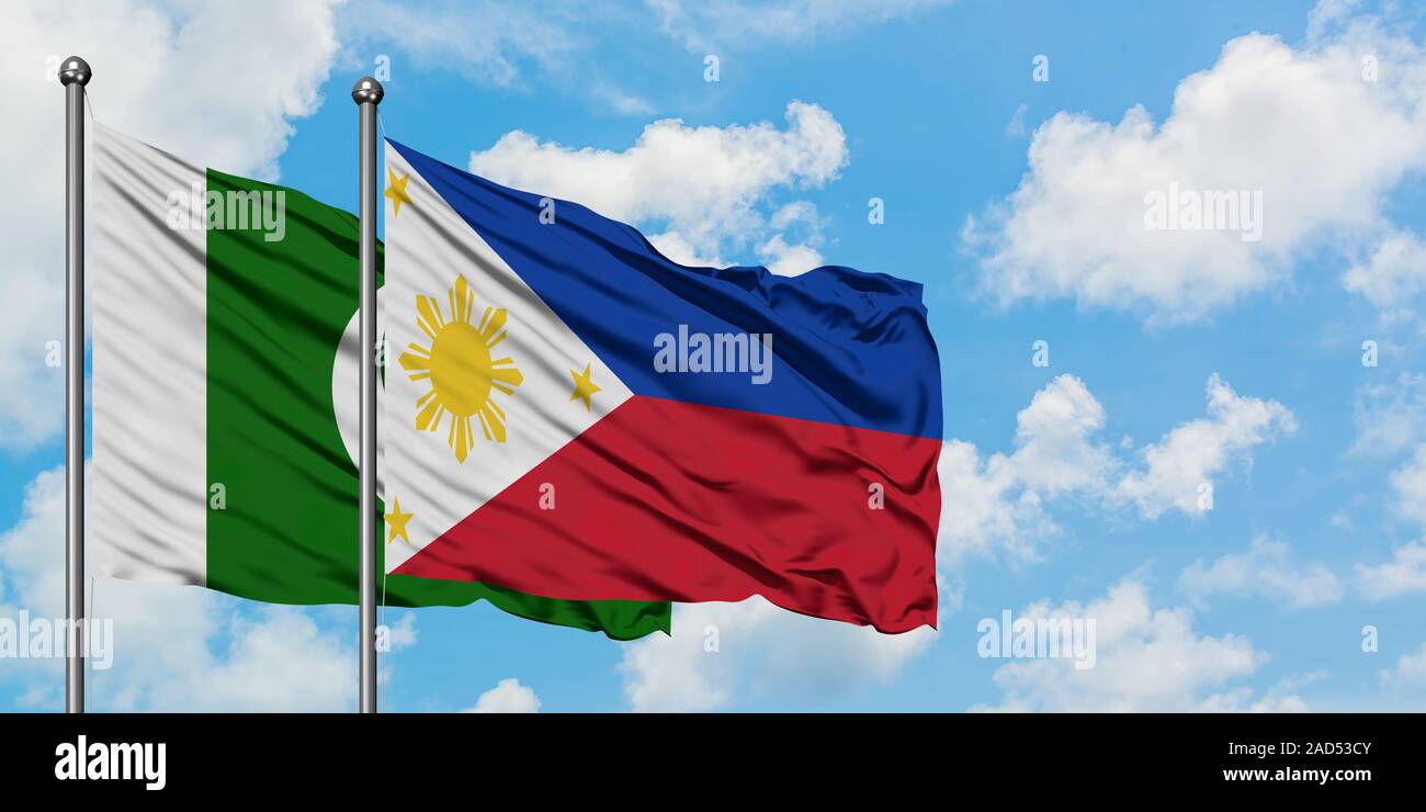 Pakistan and Philippines flag waving in the wind against white cloudy ...