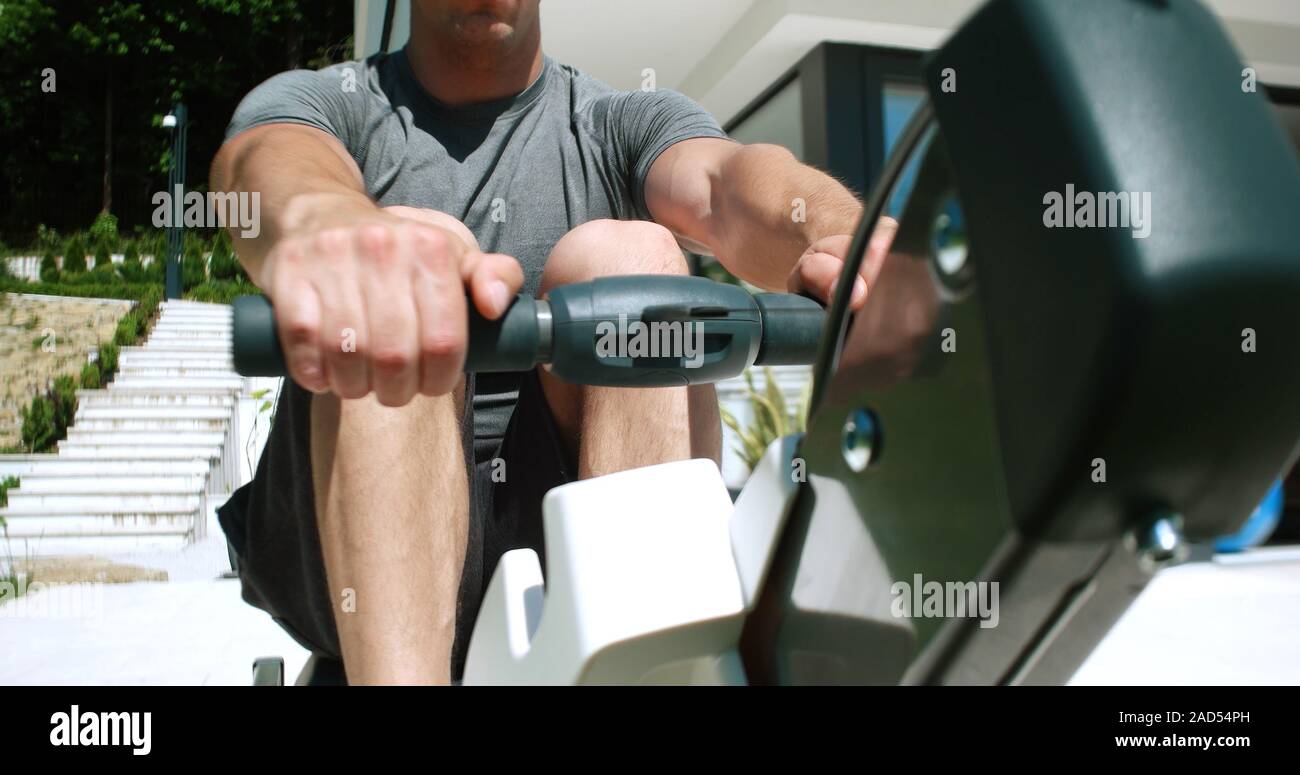Terrace Rowing Rowing Machine on terrace of beautiful villa Stock Photo - Alamy