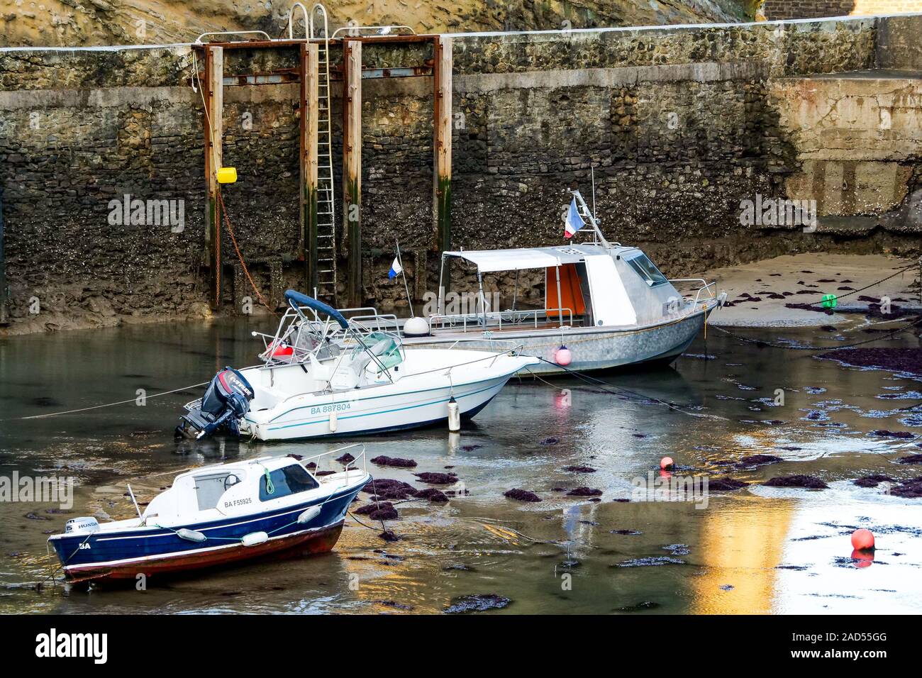 Small boats lay at Port-Vieux harbor, Biarritz, Pyrénées-Atlantiques, Pyrenees-Atlantique, France Stock Photo