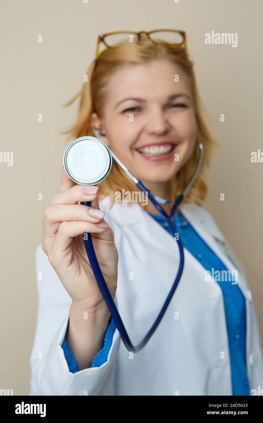 Beautiful woman in medical dressingbackground Stock Photo