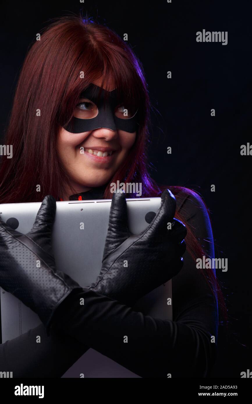 Happy thief in black gloves Stock Photo