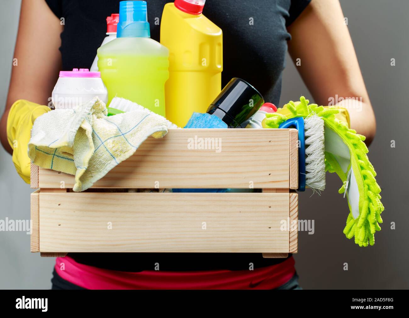 Woman in gloves with box Stock Photo Alamy