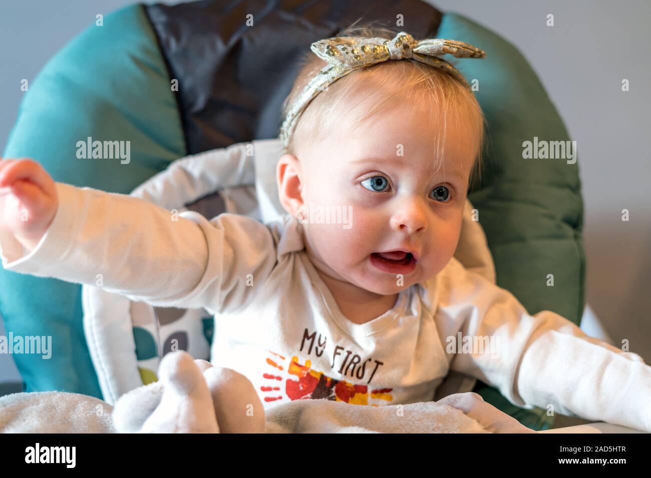 Baby Girl In High Chair Age 6 Months Stock Photo 335111303 Alamy