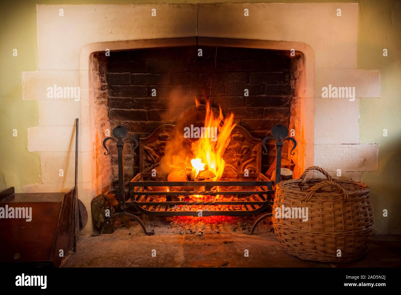 A cosy winter log fire Stock Photo