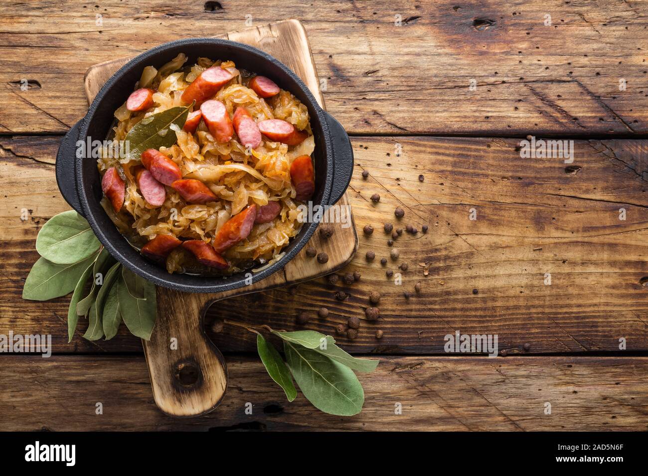 Cabbage braised with sausages, sauerkraut. German cuisine Stock Photo